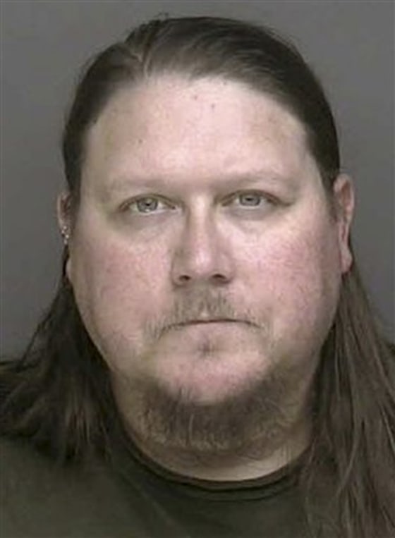 Police photo shows Josh Eastman, arrested on allegations he coached his 8-year-old neighbor to swear, then posted a video of it on YouTube.